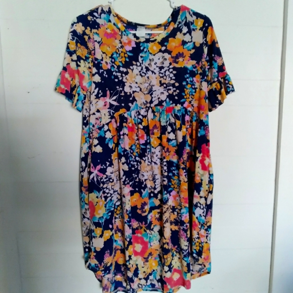 Boutique mid length, flower dress with pockets